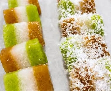 Green, white and brown chendol sago kuih with coconut.