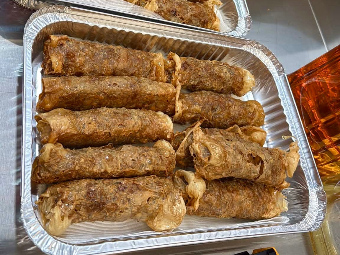 Lor Bak rolls in the foreground foil tray, with a second tray in the background. Batch photograph does not establish the selling quantity.